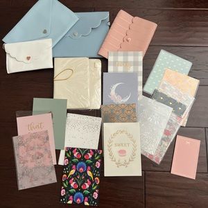 Lot of Simply Gilded notebooks and clutches